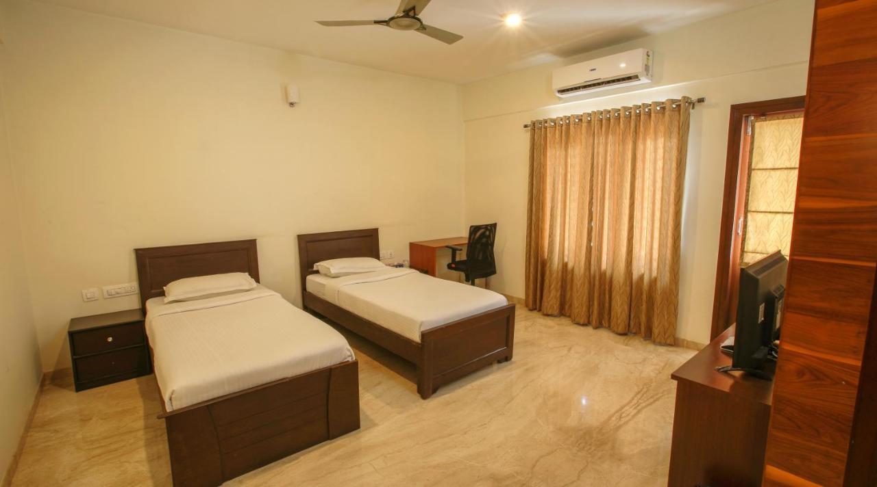Falcon Suites Yelahanka New Town บังกาลอร์ ภายนอก รูปภาพ